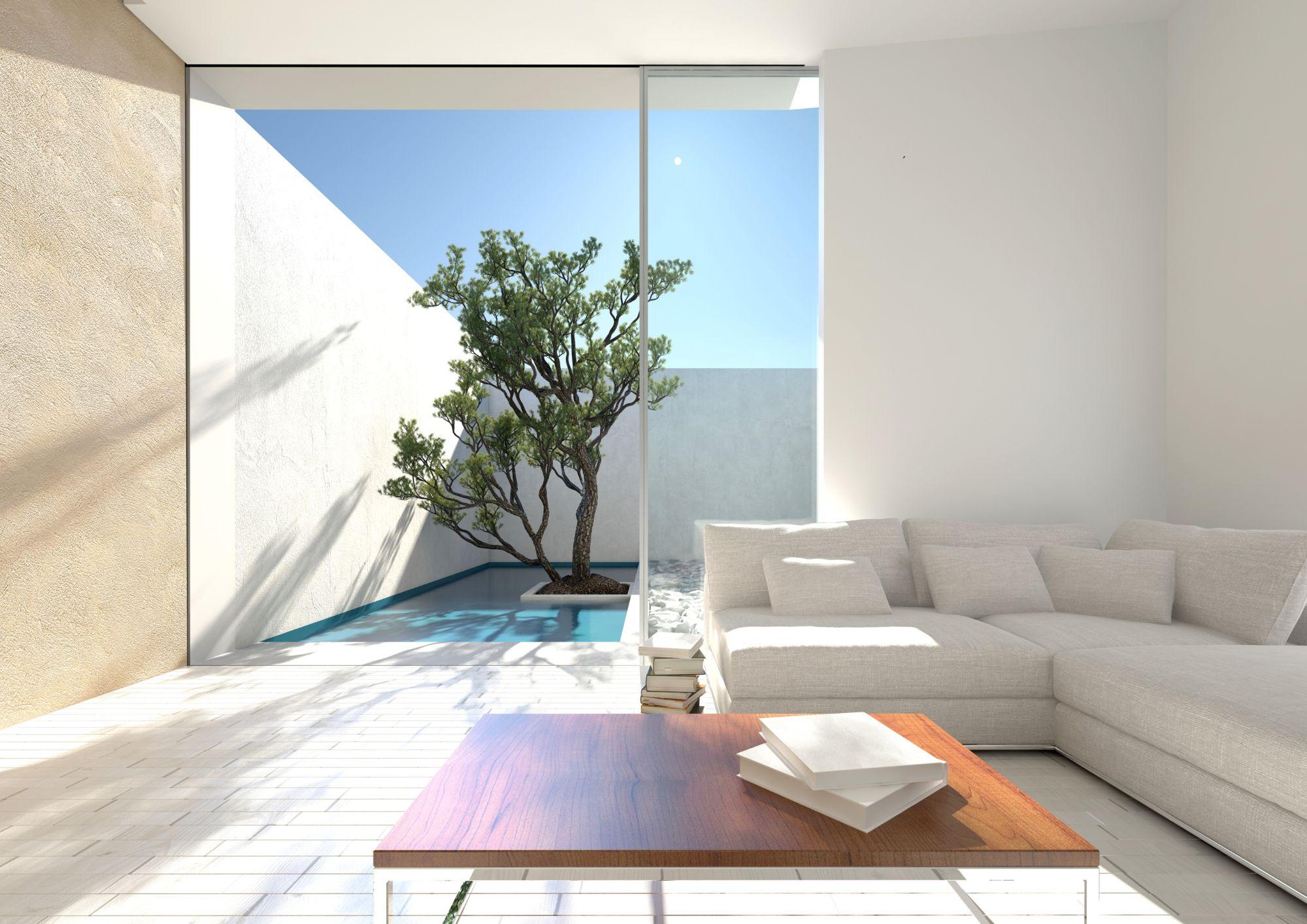 Piso grande con un balcon donde hay una planta